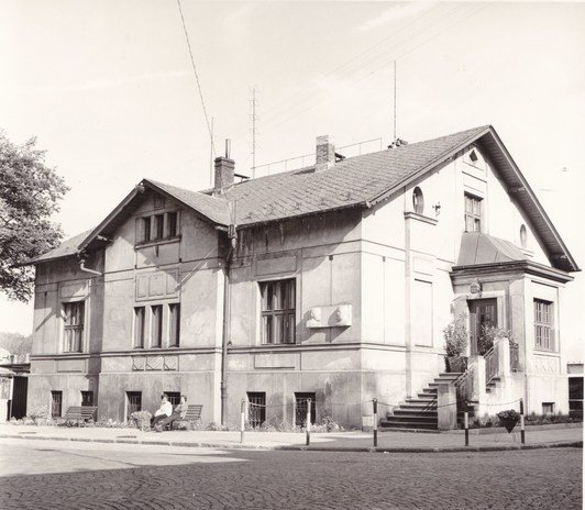 A historical photograph of the Čapek family house in Úpice